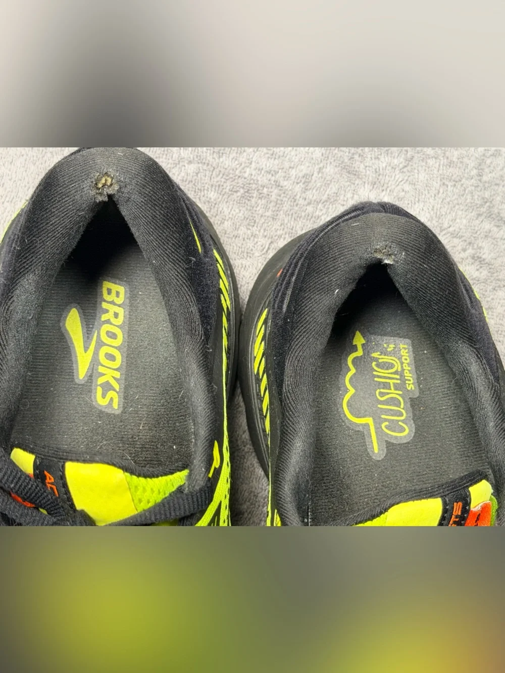 Brooks Adrenaline GTS 22 men's running shoes in a bright neon yellow, black